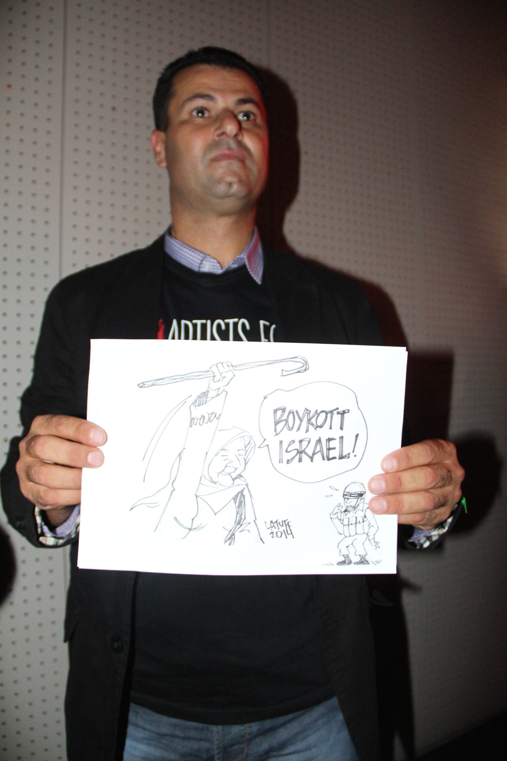 abdallah_tient_dessin_carlos-2.jpg