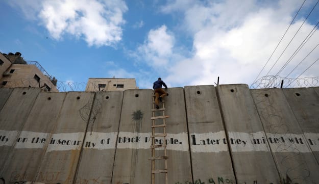le_mur_pre_s_de_ramallah._mohamad_torokman_reuters.jpg