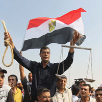 e_gypte_manifestants_balance_justice.jpg