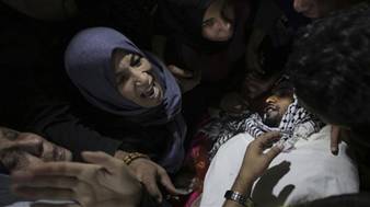 femme_gaza_et_corps_d_une_victime.jpg