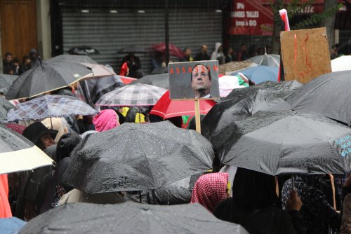 hollande_parapluies_tarek.jpg